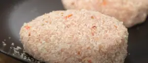 chicken patty coated with bread crumbs
